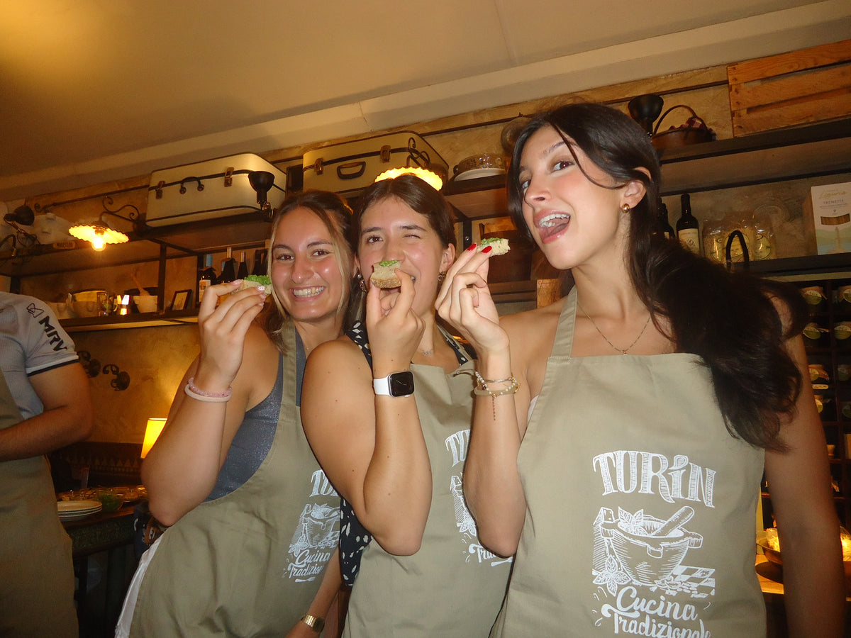 Our alumni after completing their pesto cooking class as part of the program cultural activity in Turin, Italy.